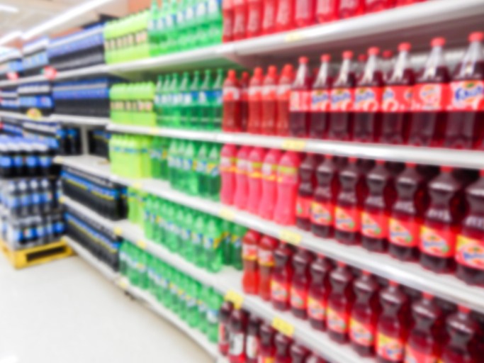 soda aisle in grocery store