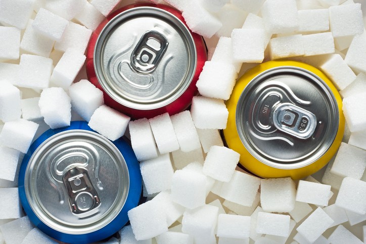 cans of soda and sugar cubes