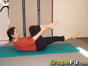 Single Leg Stretch – Pilates Exercise Guide with Photos