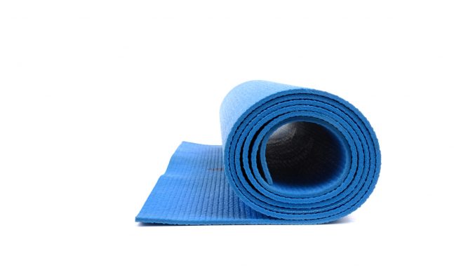 Keep a yoga mat close by to remind you to exercise